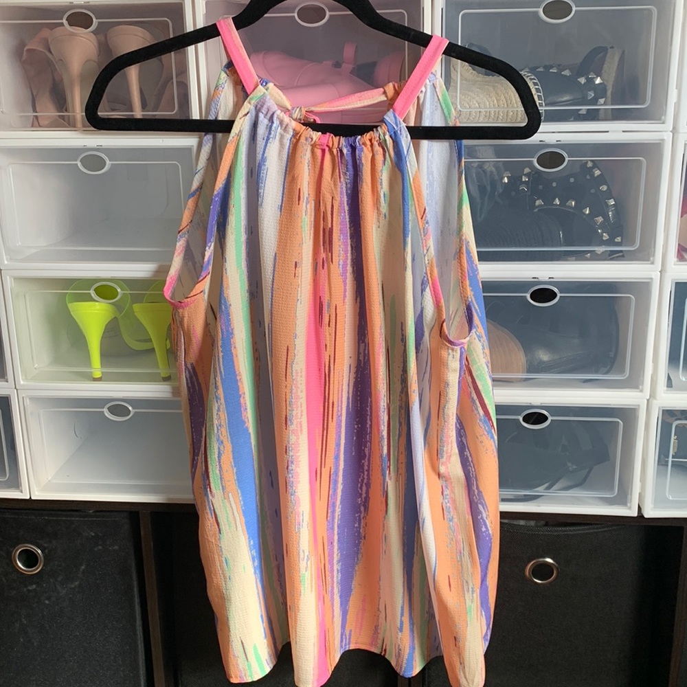 Cute tie top. Never worn.